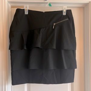 Sz. 12-14 Black Peplum ruffled mini skirt.